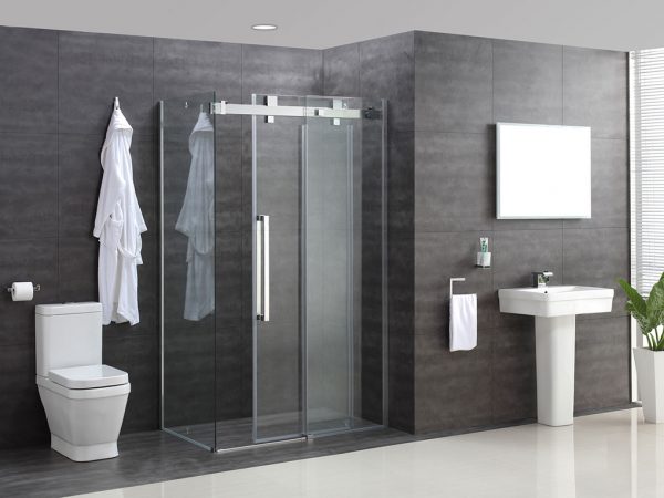 Modern style white floor and black wall tiles. Clear all glass shower with sleek silver handle.